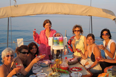 Aperitif at sunset on a sailboat